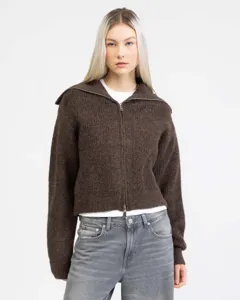 Detail view of the brown knit zip-up cardigan featuring a large lapel collar and soft texture.