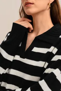 Close-up knit polo sweater with black and white stripes, casual loose fit and stylish collar.