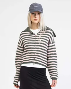 Detail view of a stylish green and pink striped half-zip knitted sweater with large lapel.