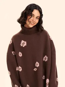 Brown oversized turtleneck knit sweater for women featuring pink floral jacquard, main product view.
