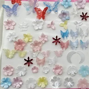 Acrylic flower and butterfly charms detail view for DIY jewelry making accessories