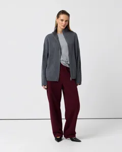 Grey ribbed knit zip cardigan detail, high neck design, comfortable casual style for autumn days.