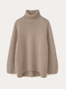 Women's loose winter wool turtleneck sweater, casual solid color long sleeve knitwear top.