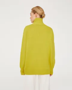 Detailed back view of a trendy chartreuse high-neck oversized knit sweater for autumn.