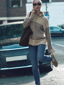 Fashionable women's half high neck striped knit sweater for casual autumn and winter.