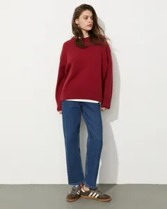 Women's casual loose-fit long-sleeve red crewneck knitted sweater for autumn and winter season.