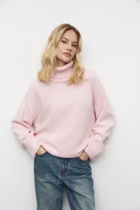 Pull col roulé rose pour femme, pull en tricot ample décontracté pour l'automne.