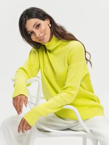 Women high neck loose knit sweater detail view, stylish autumn winter warm pullover top.