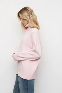 Pull à col roulé rose pour femme, pull en tricot ample et confortable à manches longues.