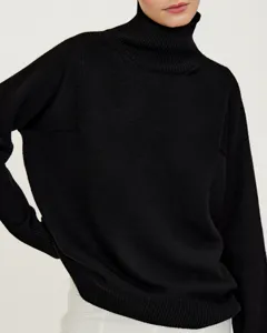 Black turtleneck sweater for women, cozy knit long sleeve relaxed fit apparel detail.