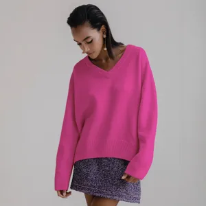 Oversized V-neck long sleeve knit sweater in bright pink color, casual chic pullover.