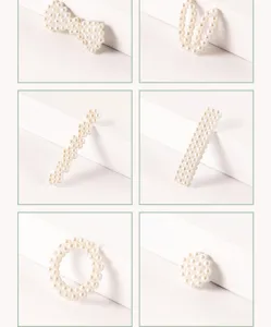 Close-up detail van handgemaakte parel DIY haaraccessoires en haarklem componenten.