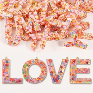 Pink heart sequin epoxy resin letter charms for DIY keychains, bags, and jewelry accessories.