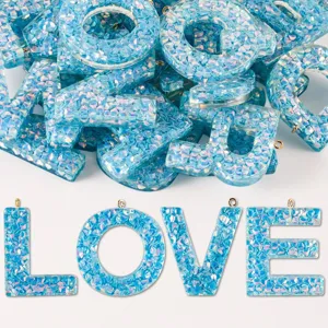 Blue glitter resin alphabet letter charms detail, perfect for DIY keychains and bag pendants.