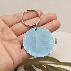 Portachiavi rotondo in acrilico specchiato con anello metallico per creazioni fai da te.