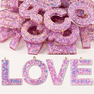 Colorful glitter resin alphabet charms for DIY keychains, cute letter pendants.