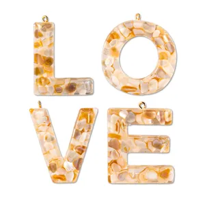 Epoxy resin natural shell letter DIY pendants, alphabet charms for cute bag keychains.