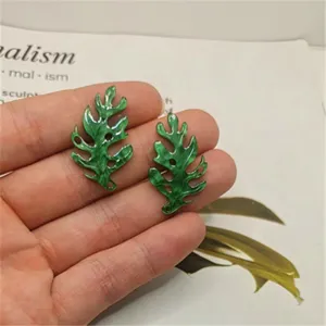Green acrylic leaf charms DIY jewelry accessories with marble texture and multi-hole design.