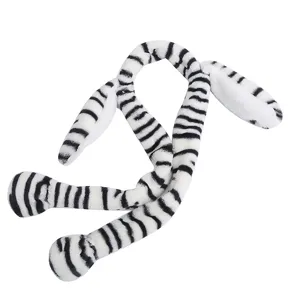 Cute plush animal ear headband with black white stripes for party hair accessory item.