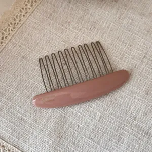 Acetate hair comb with metal teeth, elegant pink chic side hair pin for daily styling.