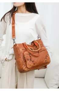 Vintage women shoulder bag large capacity brown PU leather crossbody bag with multiple zippers.