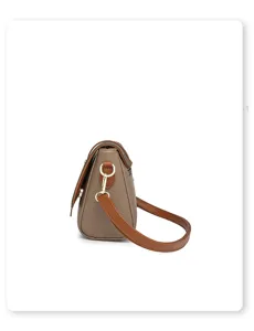 Women casual crossbody bag detail view, retro soft leather single shoulder handbag side design.