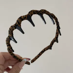 Cerchietto leopardo con denti retrò moda fascia antiscivolo per donne accessorio capelli quotidiano.