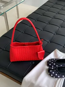 Red woven leather shoulder bag, stylish intrecciato hobo bag for women commute daily use.