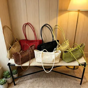 Hollow woven shoulder tote bag for women, stylish casual daily handbag with large capacity.