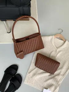 Elegant brown woven leather shoulder bag and pouch set with knit top for women chic style