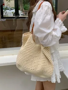 Large capacity woven shoulder tote bag, casual beach vacation handbag for women daily use.