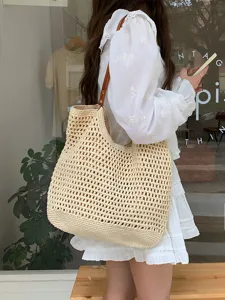 Large capacity woven straw shoulder bag for women, casual summer beach tote and commuting bag.