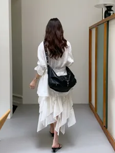 Black soft leather hobo shoulder bag casual slouchy dumpling crossbody bag for women daily commute.