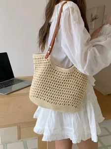 Woven crochet tote bag for women, casual beige shoulder bag with brown leather strap detail.