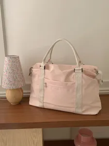 Grande borsa da viaggio in tela rosa per donna, borsone weekend con manici robusti.