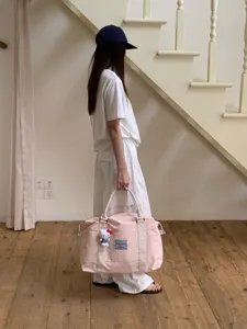 Grande borsa da viaggio in tela per donne, ideale per brevi viaggi e per la palestra.