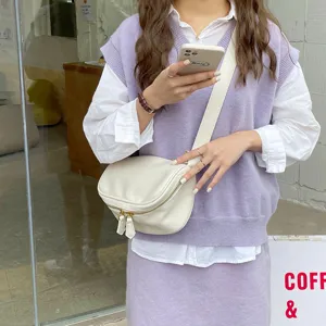 White soft leather crossbody bag with wide strap, trendy women shoulder bag for summer.