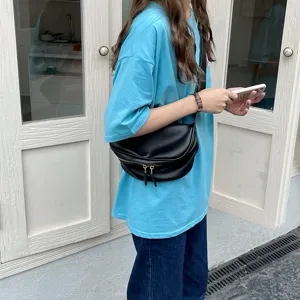 Stylish soft leather crossbody bag for women, trendy wide strap casual shoulder bag.