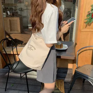 Casual borsa shopper in tela da donna, versatile borsa a tracolla con stampa letteraria.