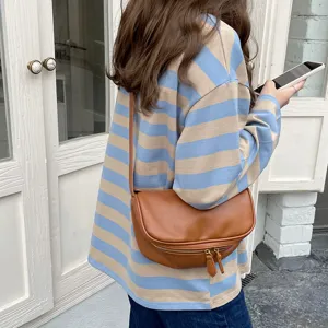 Stylish brown leather crossbody bag with wide strap, perfect daily shoulder bag for women.