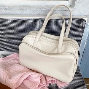Large capacity cream shoulder bag stylish PU leather duffel tote for daily travel work.