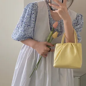Yellow pleated square small handbag detail, trendy casual shoulder bag for women summer fashion.