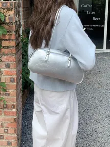 Silver metallic shoulder underarm bag detail, trendy Korean style chic fashion accessory.