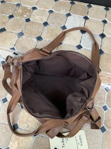 Brown large capacity PU leather shoulder bag tote travel bag with detailed interior view