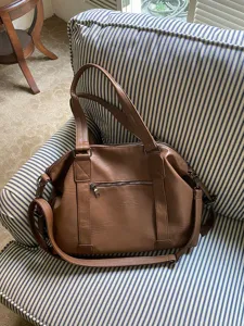 Brown faux leather travel duffel bag, large capacity shoulder tote bag for daily use.