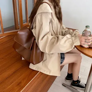 Retro large capacity brown leather shoulder bag for women, versatile autumn winter casual tote.