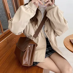 Detailed view of the retro brown leather shoulder bag showcasing versatile everyday style.