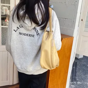 Stylish large capacity yellow shoulder tote bag for women, ideal for travel and daily commute.
