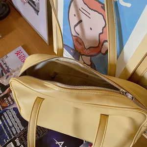 Women stylish yellow PU leather shoulder tote bag, large capacity casual underarm handbag.