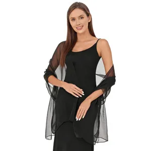 Detailed view of elegant black sheer shawl, perfect for evening dresses, weddings and parties.